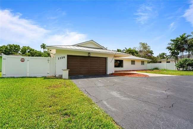 Building Photo - 1120 E Tropical Way