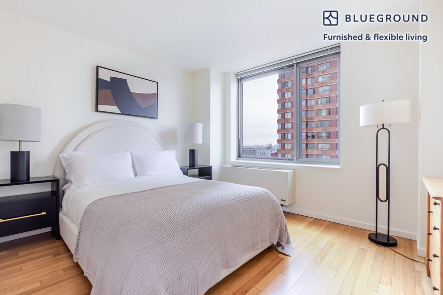 Building Photo - 4-75-75 48th Ave