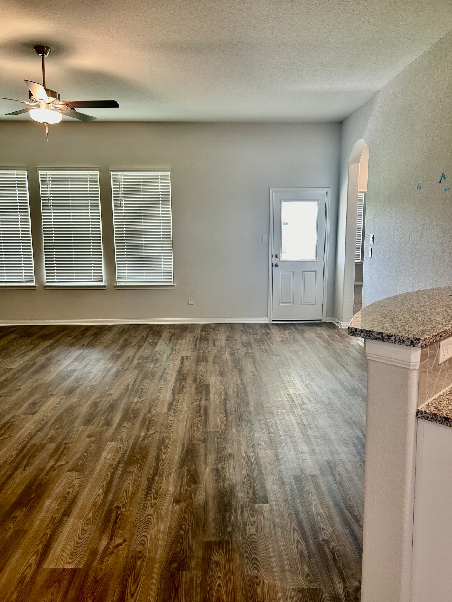 As you tour the home you are greeted by a large family room that is open to the Kitchen. - 509 Turtle Dove Dr