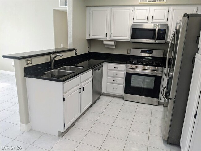 Building Photo - 5710 E Tropicana Ave