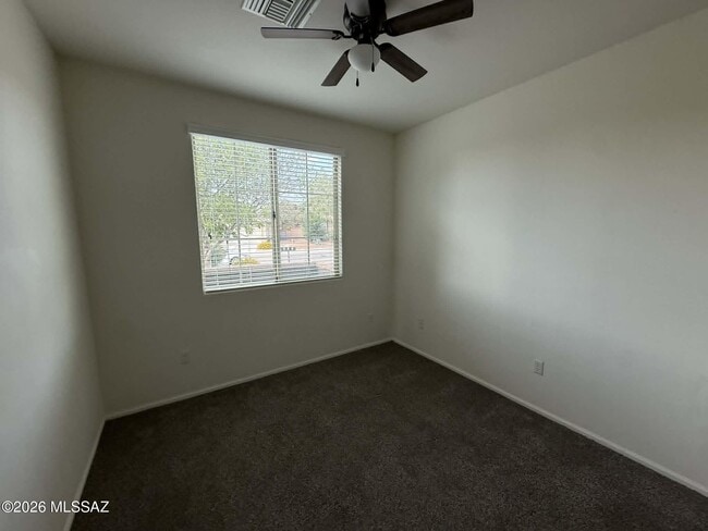 Building Photo - 10450 S Cutting Horse Dr
