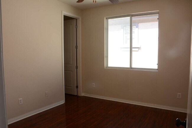 Building Photo - "Spacious 4-Bedroom Oasis with Granite Tou...