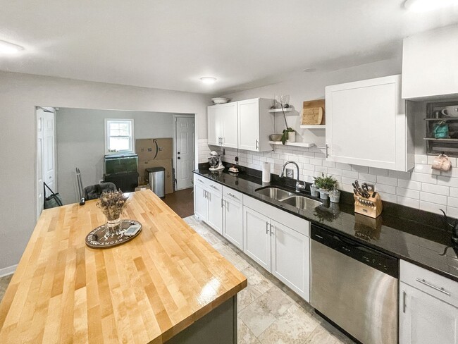 Building Photo - Updated single-family home in the heart of...