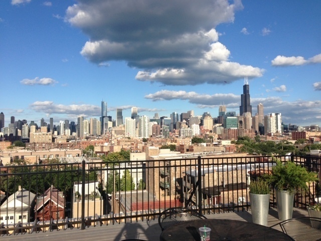 View from the shared rooftop deck, taken at one of the four grills (gas provided). - 515 N Noble St