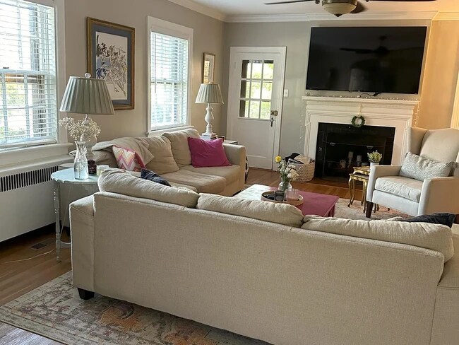 Front door enters to living room - 4405 W Franklin St