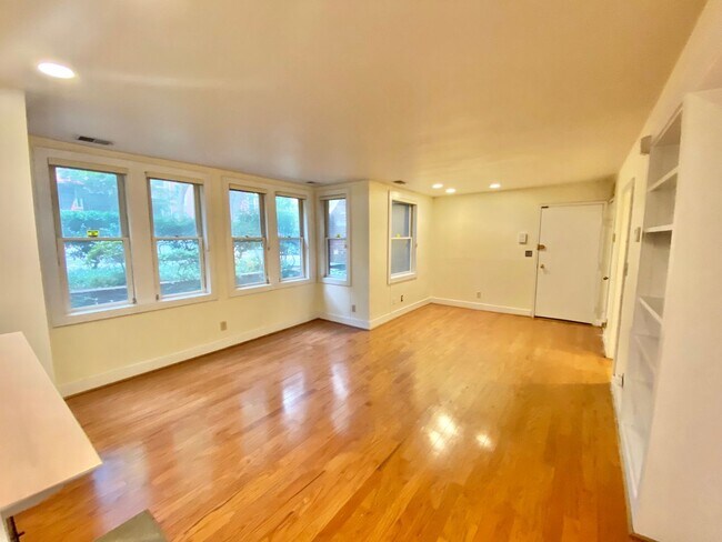 Building Photo - SAVE OVER $200!* Dupont Circle 1 Bedroom Charmer with Patio, Fireplace, Central Air, Washer/Dryer!