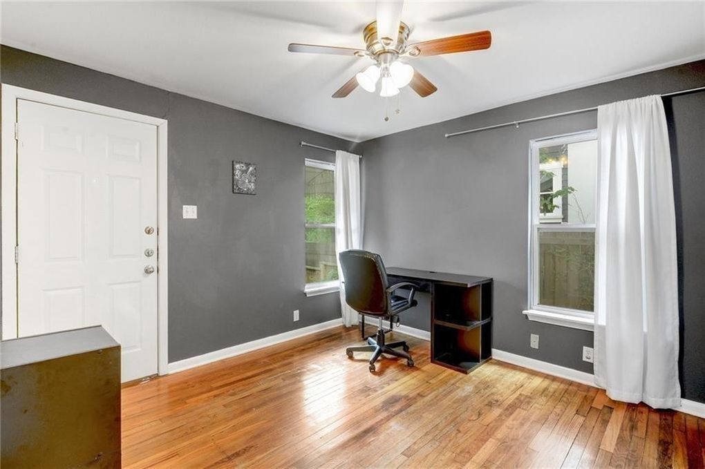 Bedroom 4, now bright white, sunny windows, small desk nook & a private entry - 1410 Ulit Ave