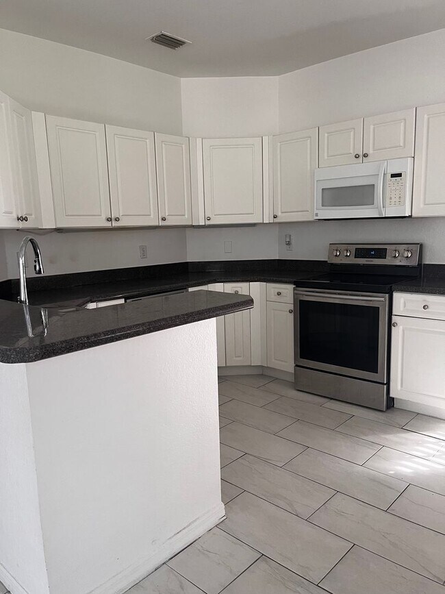 Building Photo - COMING SOON! Space, Style & Serenity! Enjoy comfortable living in this beautiful 4-bedroom home f...