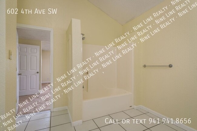 Building Photo - 602 4th Ave SW