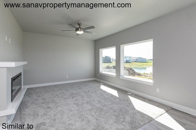 Building Photo - Stunning 4-Bedroom Home with Finished Base...
