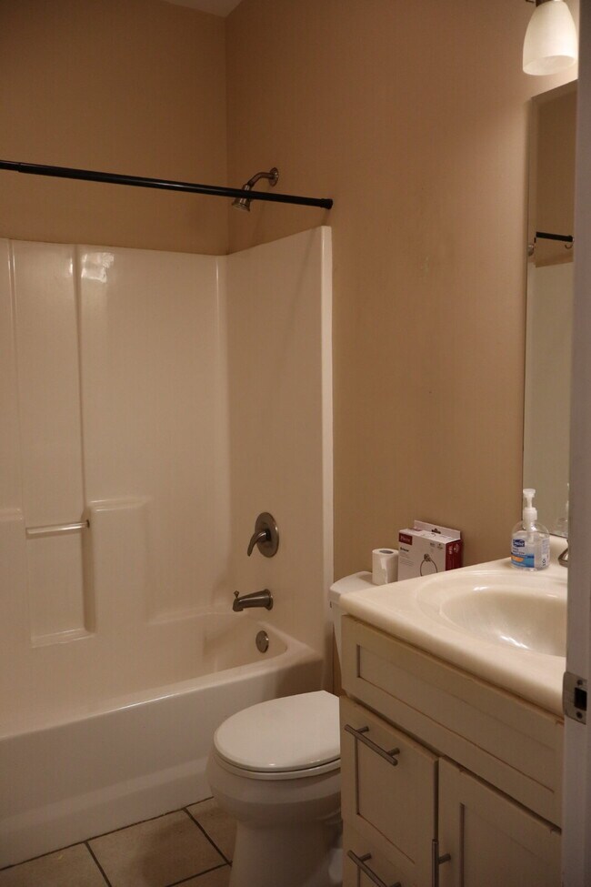 Building Photo - Expansive Mostly-Furnished Residence featuring 3 Bedrooms, a Completed Basement, and a Loft Space