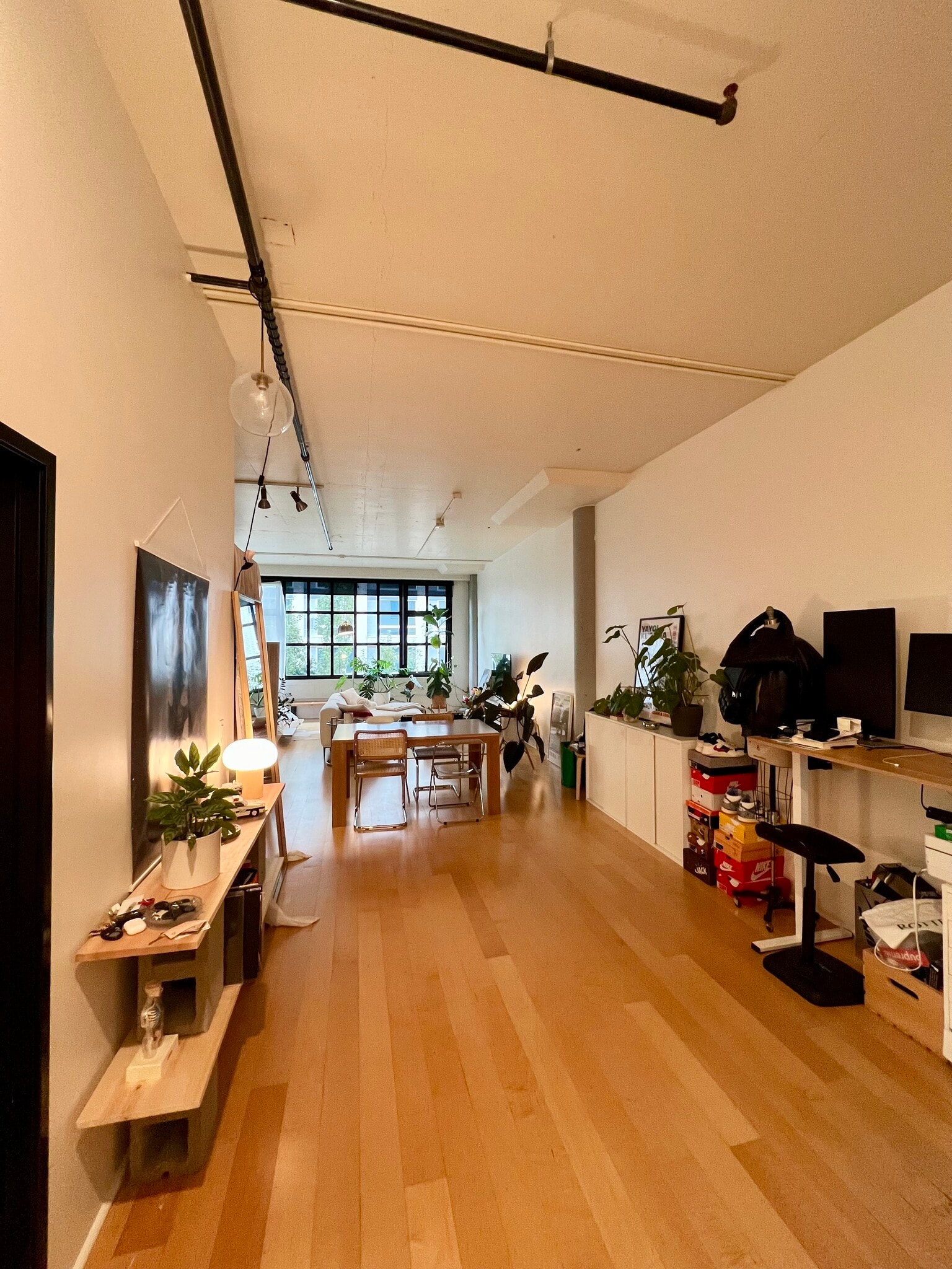 View from front door - Layoutasaccommodates defined living, dining, WFH & sleeping spaces - 1400 NW Irving St