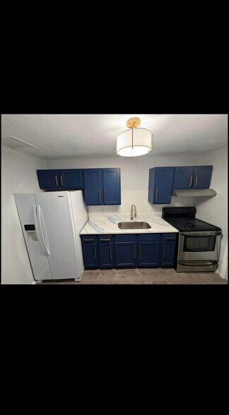 Building Photo - 3719 138th Ave