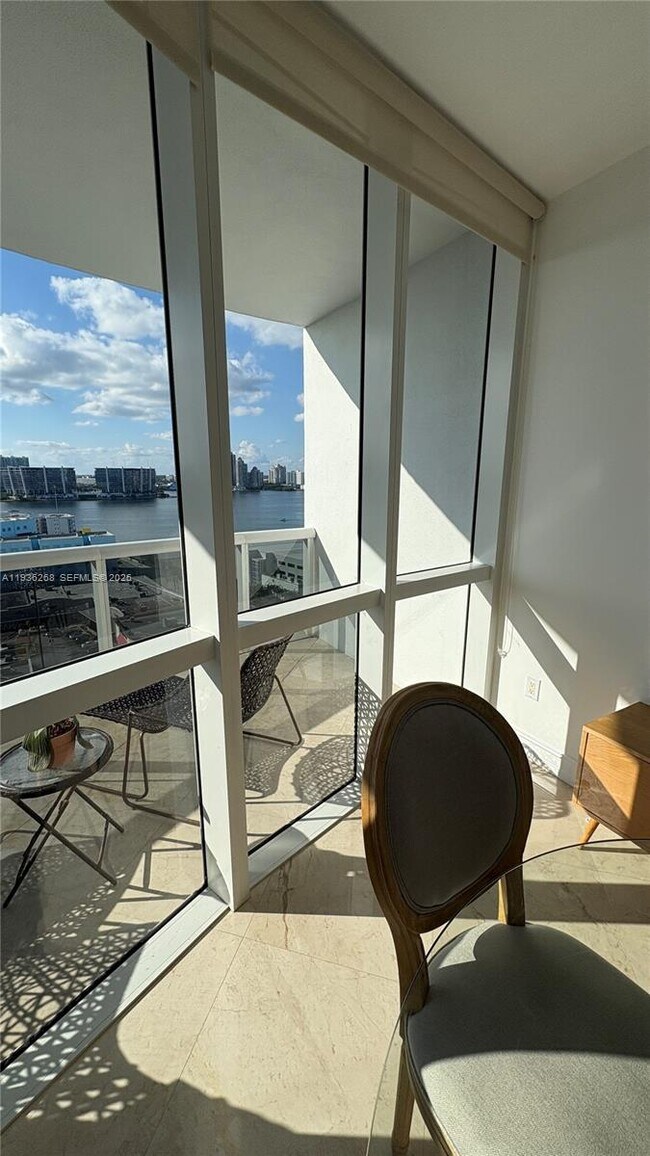 Building Photo - 18201 Collins Ave