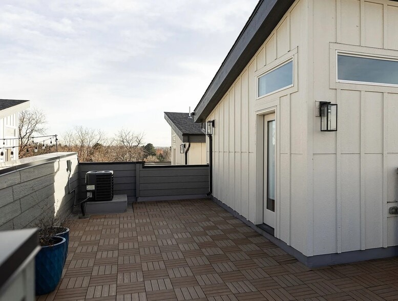 Private rooftop with a view of downtown, DU, mountains, and surrounding areas - 3505 S Marion St