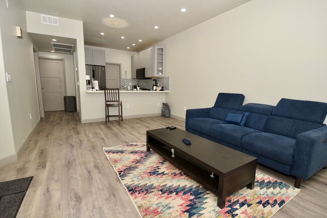 Primary Photo - MODERN 1 BED 1 BATH CONDO WITH ATTACHED GA...