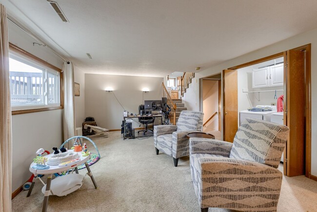 Building Photo - Bright & Airy Tri-Level With Finished Base...