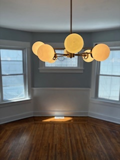 Updated lighting fixture in the dinning room - 381 Huntington Ave