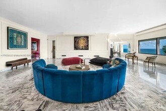 Building Photo - 4 br, 3.5 bath Condo - 5255 Collins Ave # ...