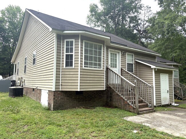 Building Photo - 105 Lonesome Wind Way