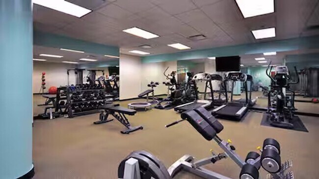 Building Photo - Authentically Cool Downtown Austin Condo | Walk Everywhere | Fully Furnished