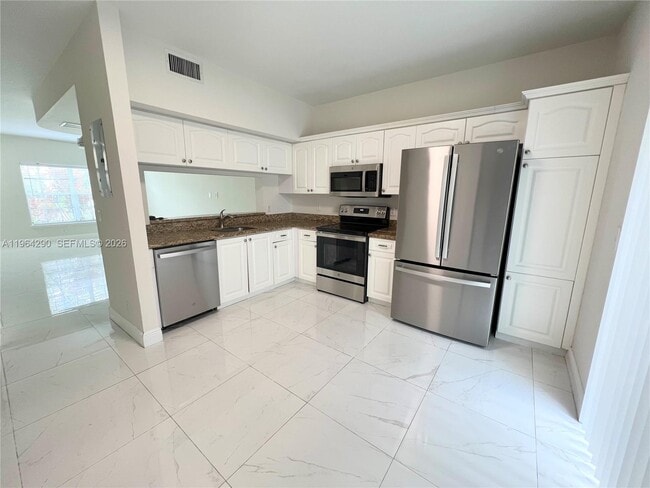 Building Photo - 9820 NW 56th Pl