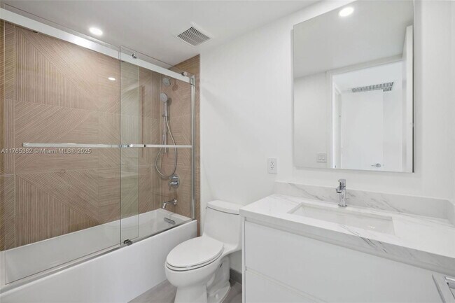 Building Photo - 5065 Collins Ave