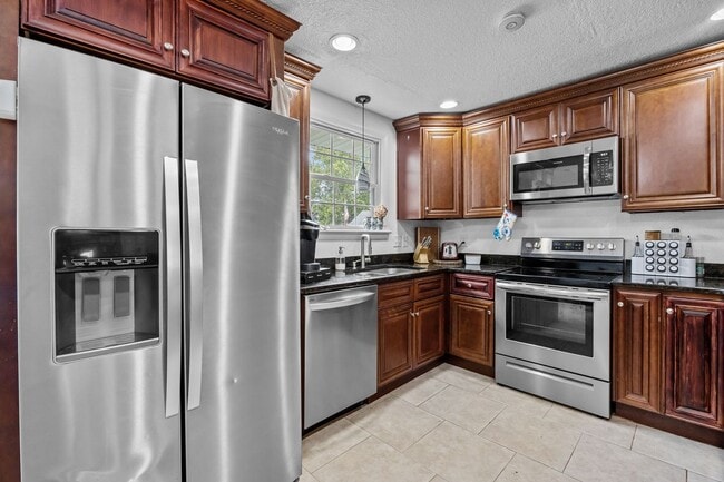Building Photo - Spacious 4-Bedroom Home with Saltwater Pool & Large Fenced Yard