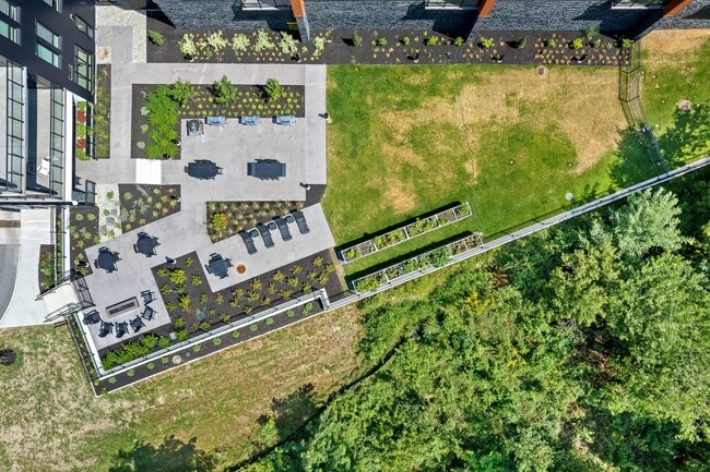 Building Photo - Courtyard Calm Meets City Convenience – 1B...