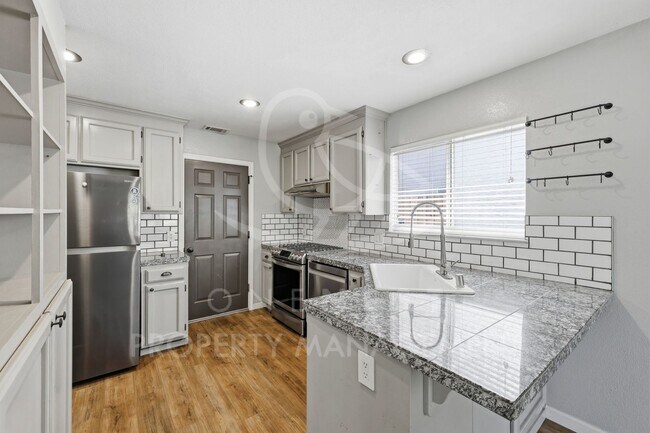 Building Photo - Charming and thoughtfully upgraded 3-bedroom, 2-bathroom single-level