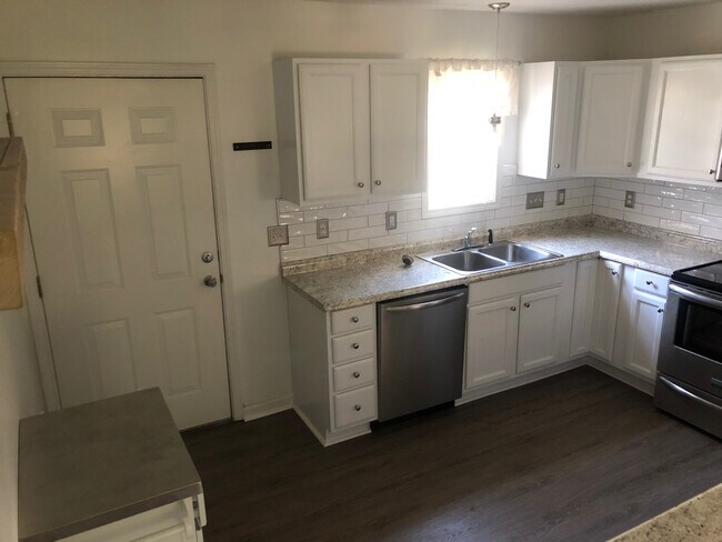 Kitchen w/ stainless steel appliances - 24 Douglas Fir Ave