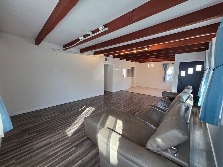 View from other side of living room, facing dining room. - 456 E Indian Rock Rd