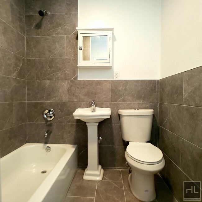 Building Photo - Floor through 3 Bedroom with backyard on W...