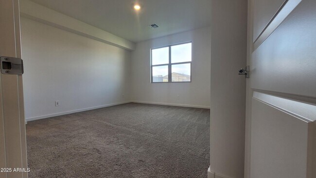 Building Photo - 15998 W Smoketree Dr