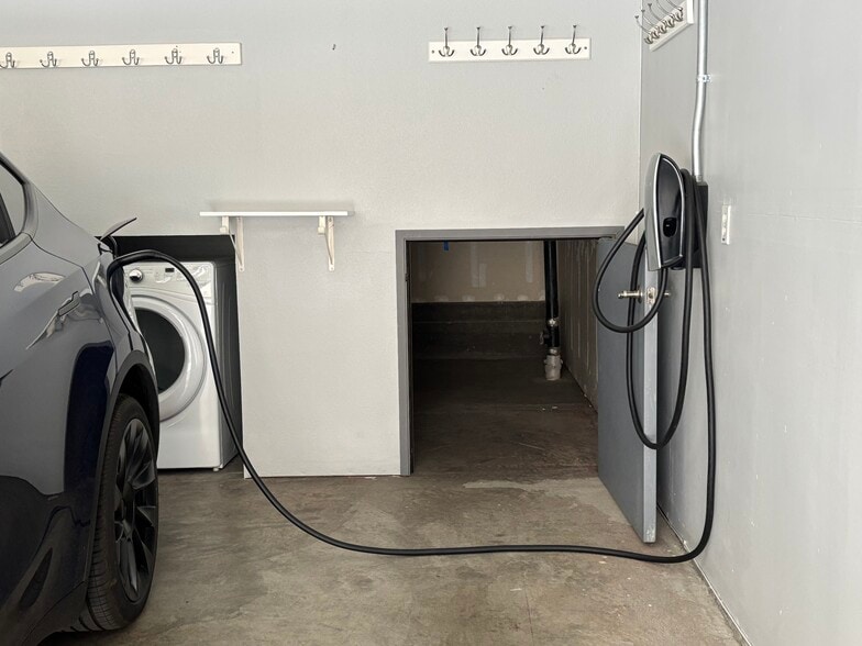 EV charger in 2 car garage - 180 Oberg Ct