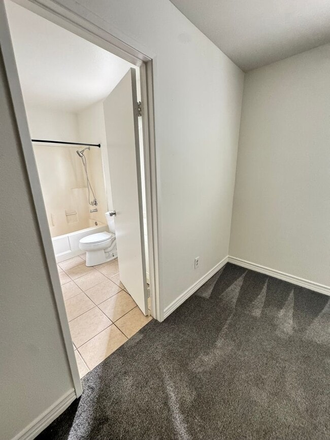 Building Photo - Welcome home to this charming and cozy corner-unit condo in the heart of Rancho Cucamonga!