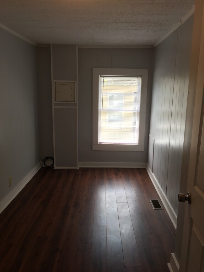 Building Photo - Your Own Home and Yard Centrally Located 3...