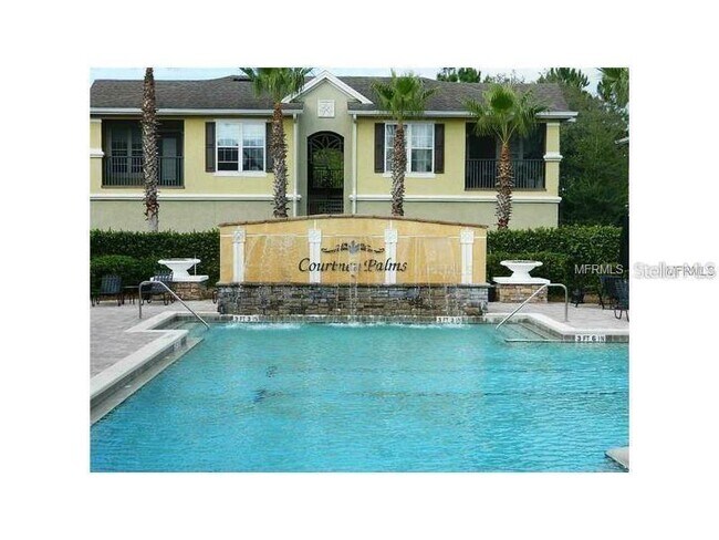 Building Photo - 10021 Courtney Palms Blvd