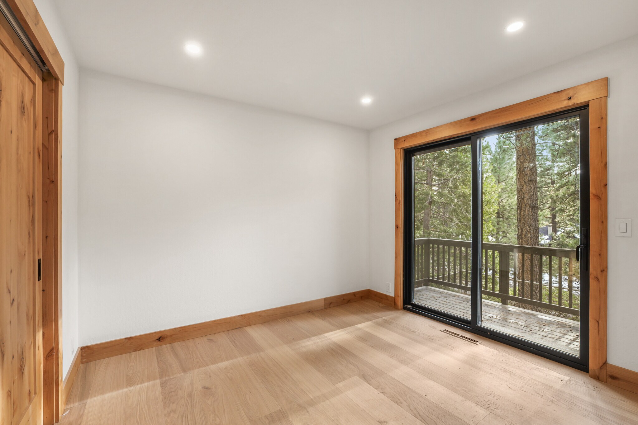 Bedroom 3 View and Sliding Door to Rear Balcony - 1029 Tomahawk Trl