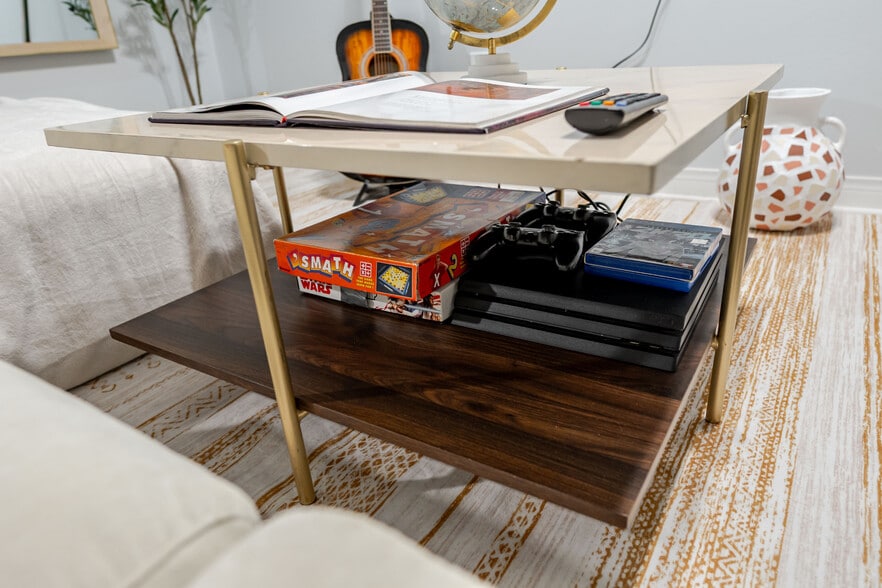 A fun setup with board games and a game console for hours of entertainment. - 4989 Randlett Dr