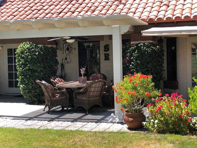back patio facing stream - 116 Avellino Cir