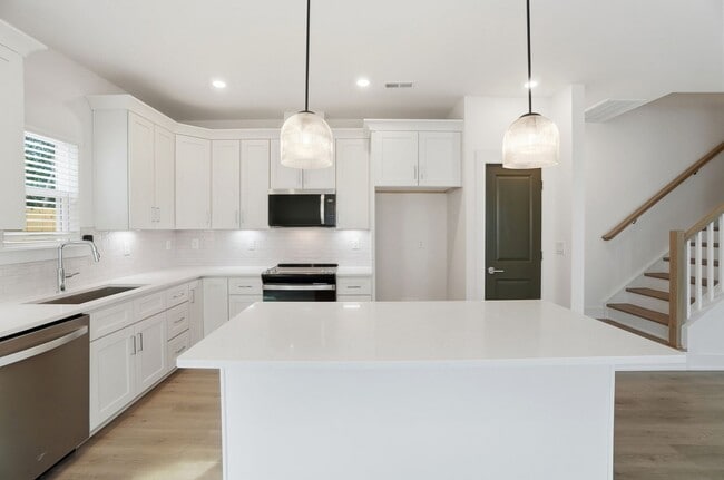 Building Photo - Bright & Modern New Construction Townhome