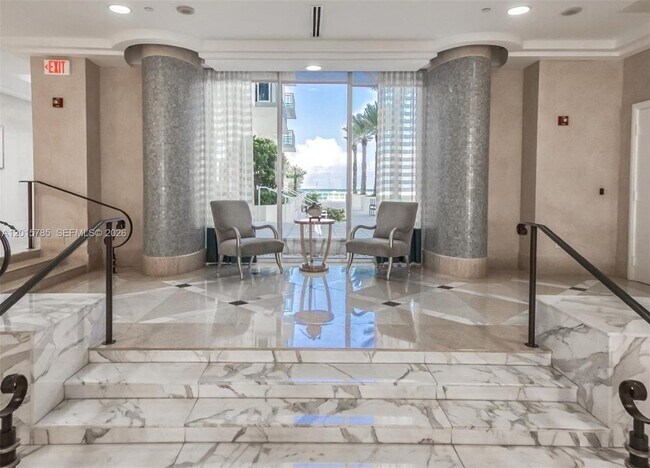 Building Photo - 6917 Collins Ave