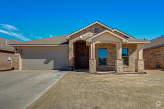 Building Photo - "Spacious 4-Bedroom Haven with Granite Cou...