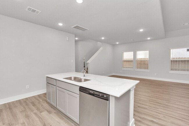 Building Photo - Welcome to the Redbud — A Fresh Take on Modern Living.