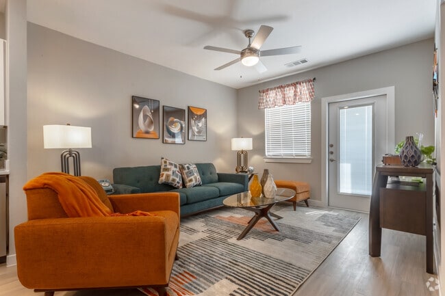 1BR, 1BA - 682SF - Living Room - Aria at  Ella-(New)
