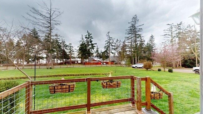 Building Photo - Wake up just steps from Penn Cove with space to spread out, store your boat, and fully enjoy Whid...