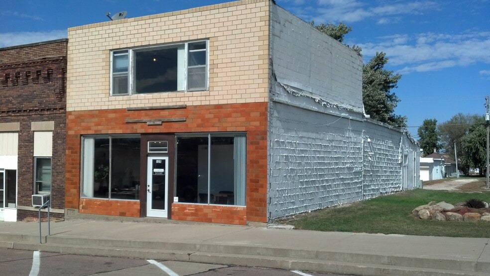 Main building with commercial space below - 125 Main St