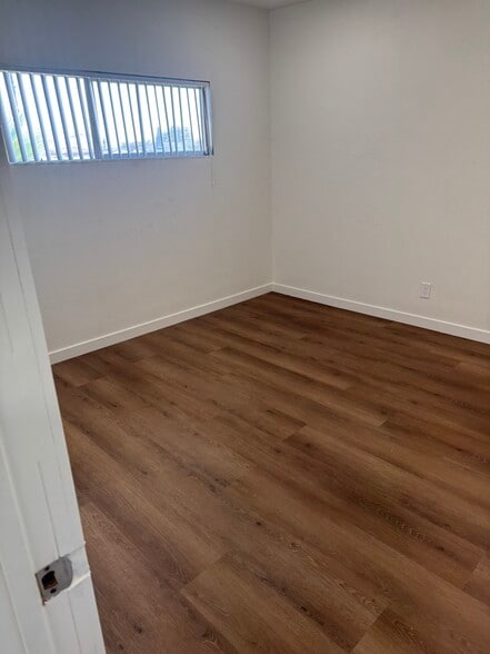 Bedroom 2 New Flooring - 15015 Gramercy Pl