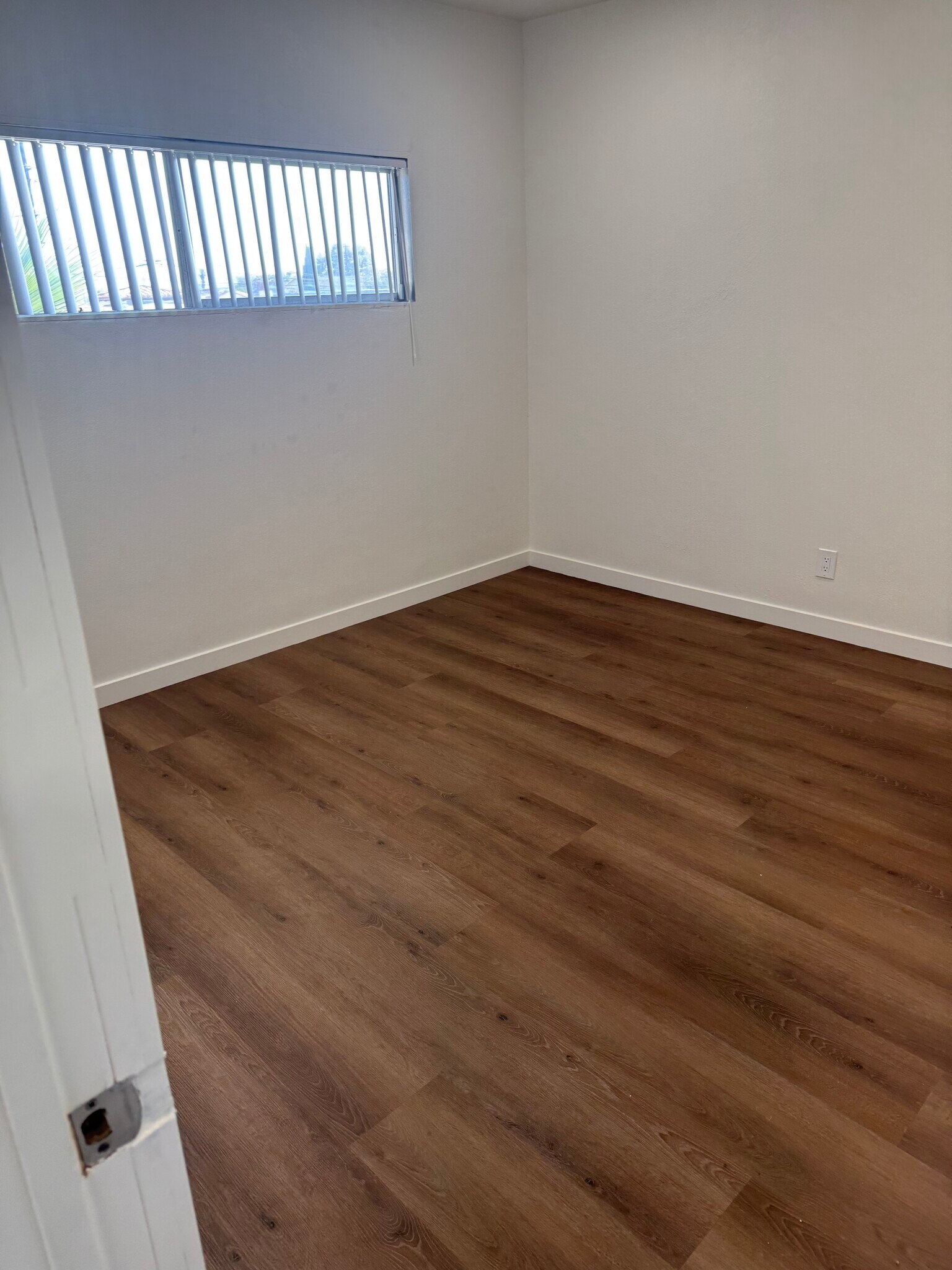 Bedroom 2 New Flooring - 15015 Gramercy Pl